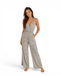 Zomerse jumpsuit Stradivarius crème-wit zwarte stippen bandjes met ruches