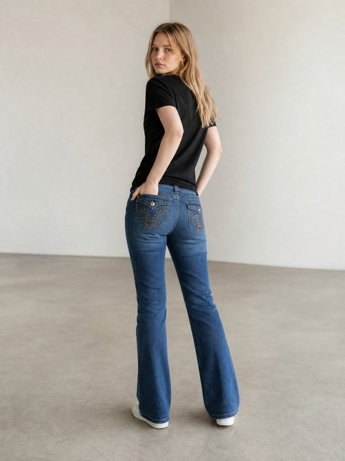 Apt. 9 dark wash denim bootcut jeans with rhinestone and embroidery detail on back pockets.