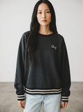 Obey grey oversized crewneck sweatshirt with embroidered logo and striped ribbed hem. Streetwear style.
