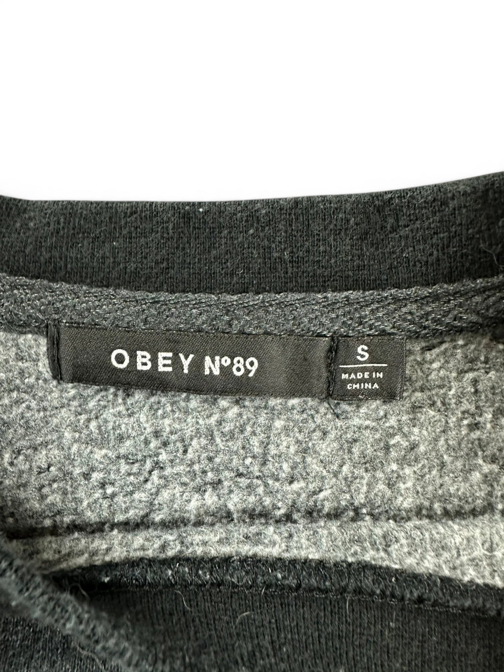 Grijze Obey crewneck sweater geborduurd logo oversize pasvorm