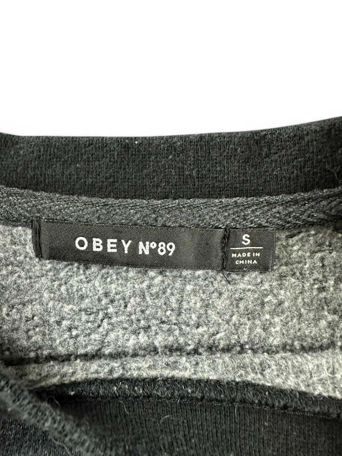 Grijze Obey crewneck sweater geborduurd logo oversize pasvorm