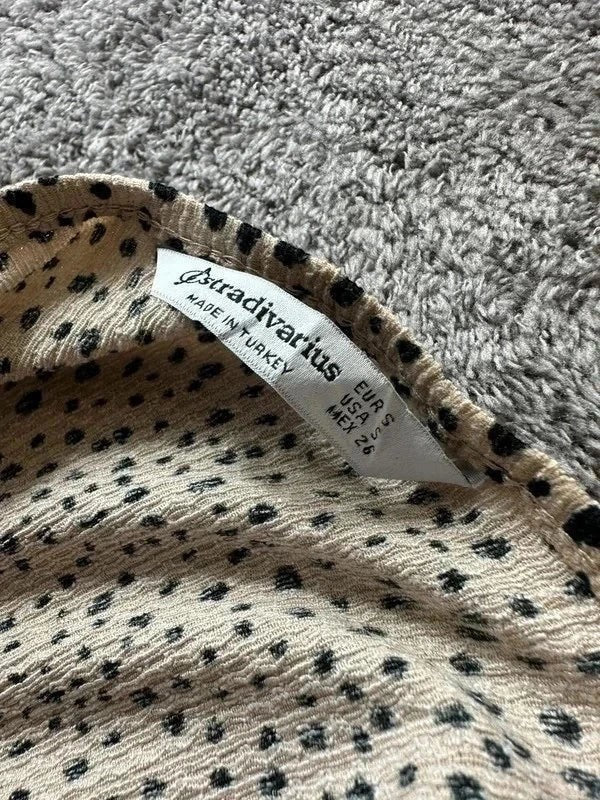 Zomerse jumpsuit Stradivarius crème-wit zwarte stippen bandjes met ruches