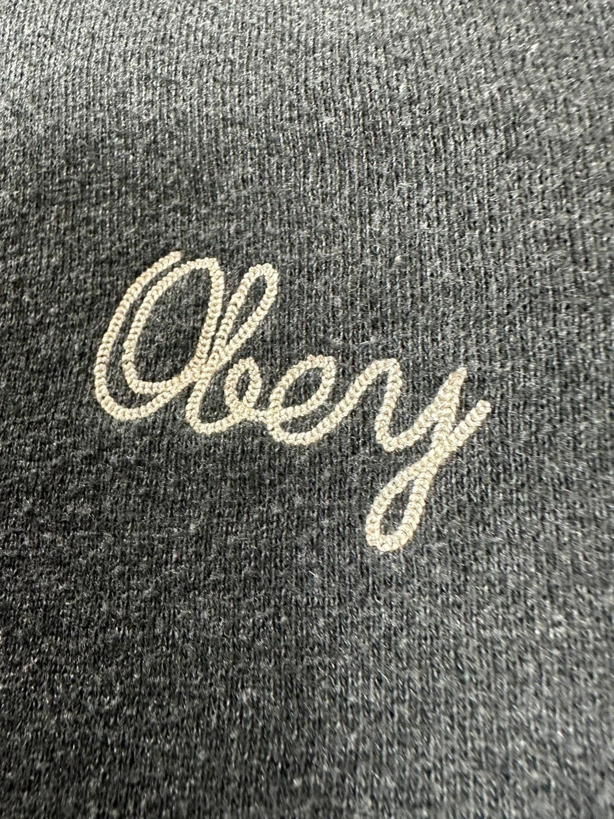 Grijze Obey crewneck sweater geborduurd logo oversize pasvorm