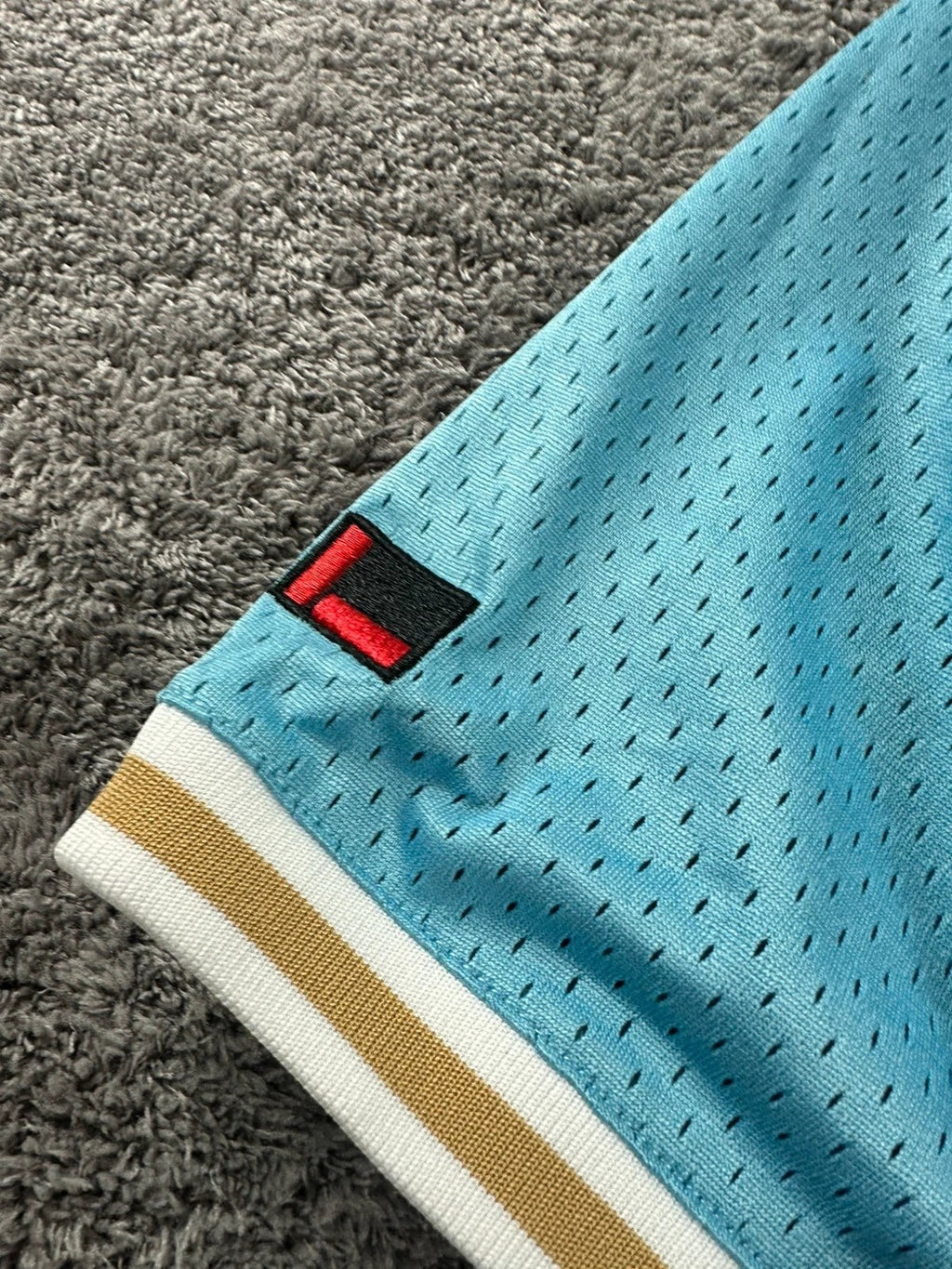 Honkbalstijl T-shirt MLB FUBU lichtblauw met geborduurde details – Oversized breed model