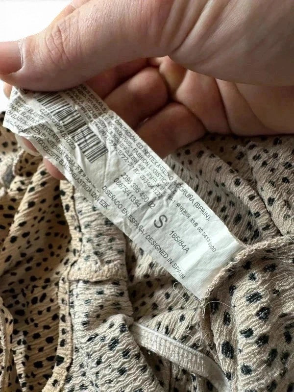 Zomerse jumpsuit Stradivarius crème-wit zwarte stippen bandjes met ruches