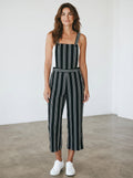 Rewearz black and white striped vintage chic jumpsuit with wide legs and adjustable straps.