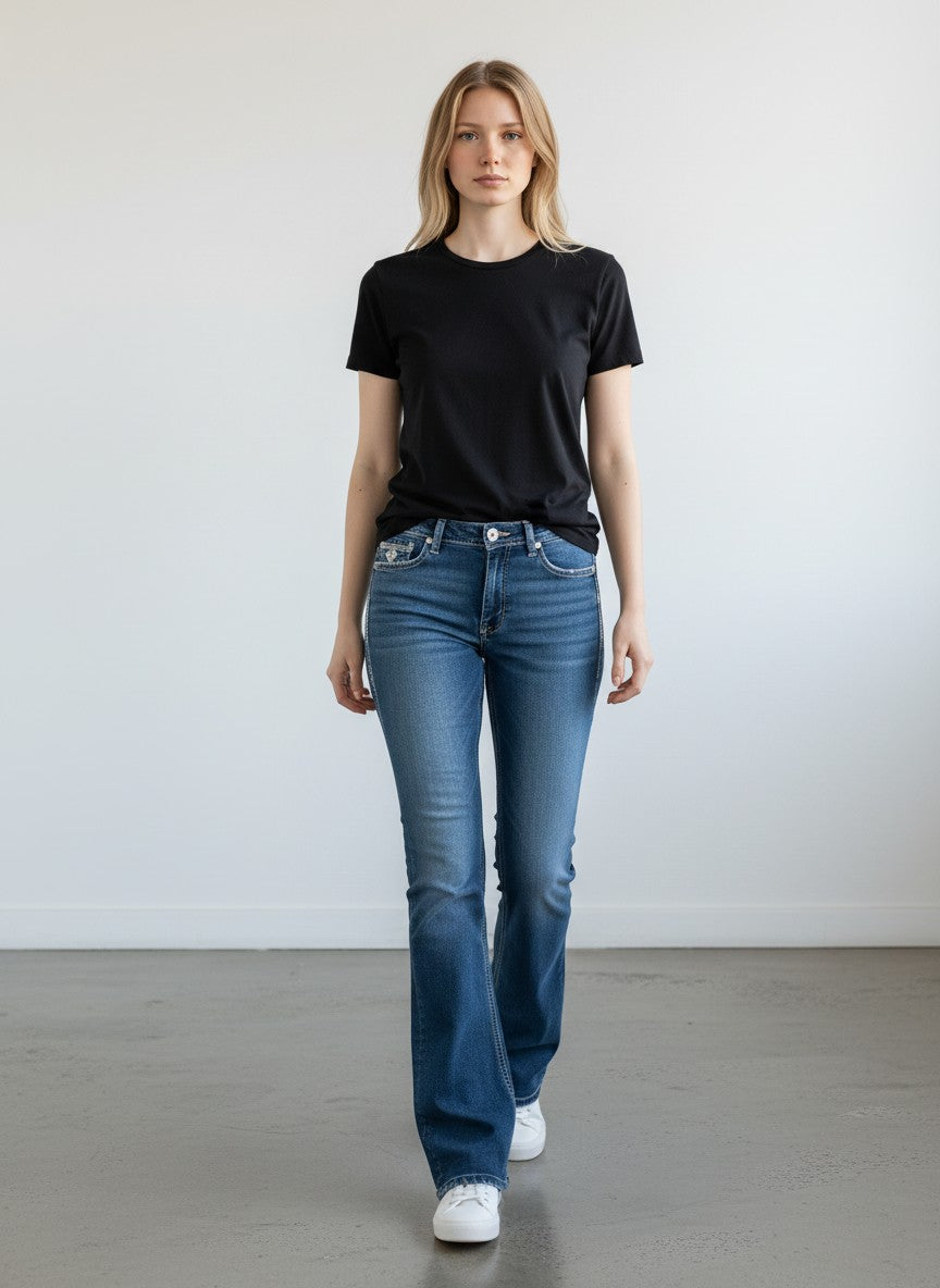 Rewearz blue wash bootcut jeans with white stitching and rhinestone embellished back pockets.