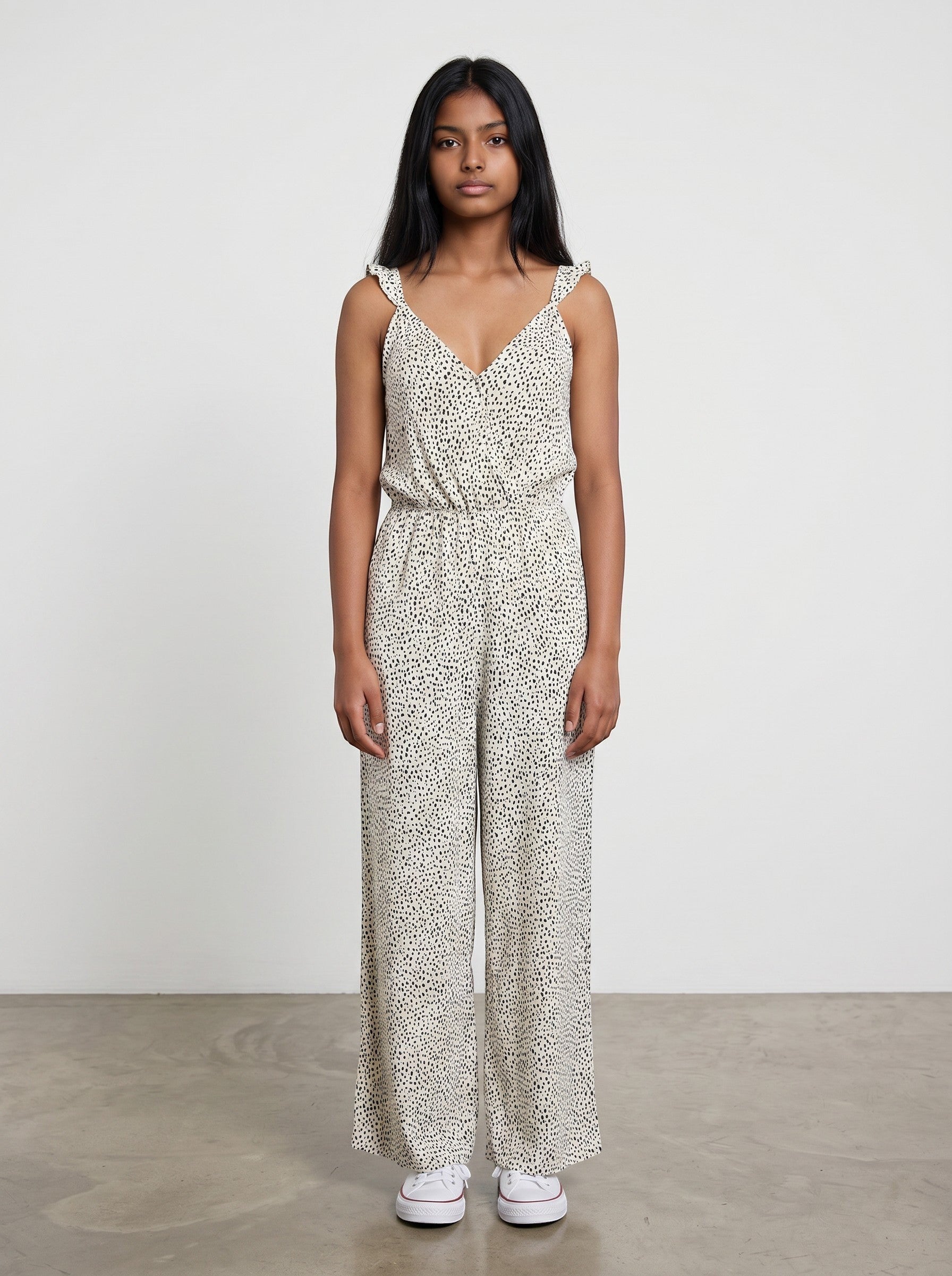Rewearz cream and black polka dot wide leg jumpsuit with ruffle straps and V-neck