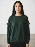 Rewearz green crew neck knit sweater with ruffle details on shoulders, oversized fit.