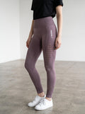 Rewearz Gymshark Energy Seamless high-waisted mauve leggings with cut-out details and ribbed texture.