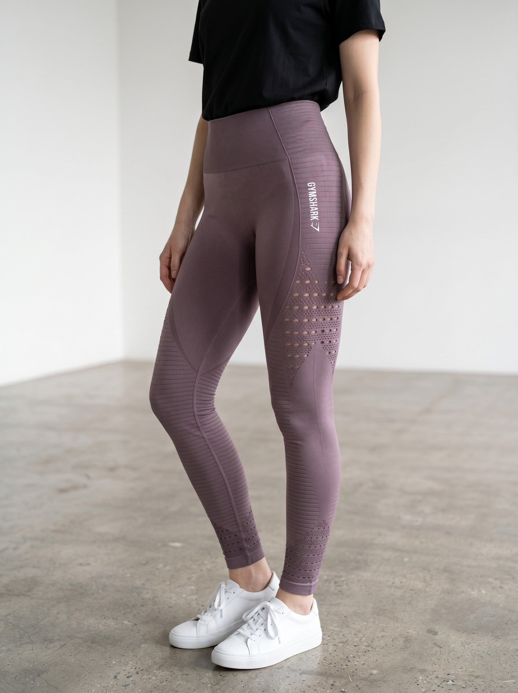 Rewearz Gymshark Energy Seamless high-waisted mauve leggings with cut-out details and ribbed texture.