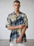 Rewearz Vintage Kahala Hawaiian shirt with marlin and sailfish print in blue, beige, and white. 100% cotton.