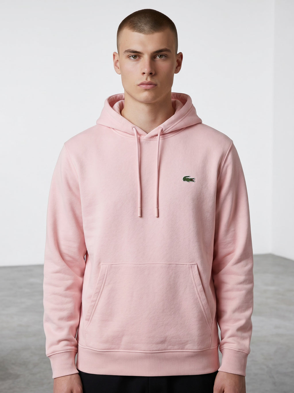 Rewearz pink cotton blend hoodie with embroidered green crocodile logo on chest, drawstring hood, and front pocket. Size 3 small.