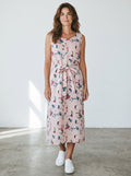 Rewearz pink linen midi dress with abstract floral print and tie waist, made in Italy.