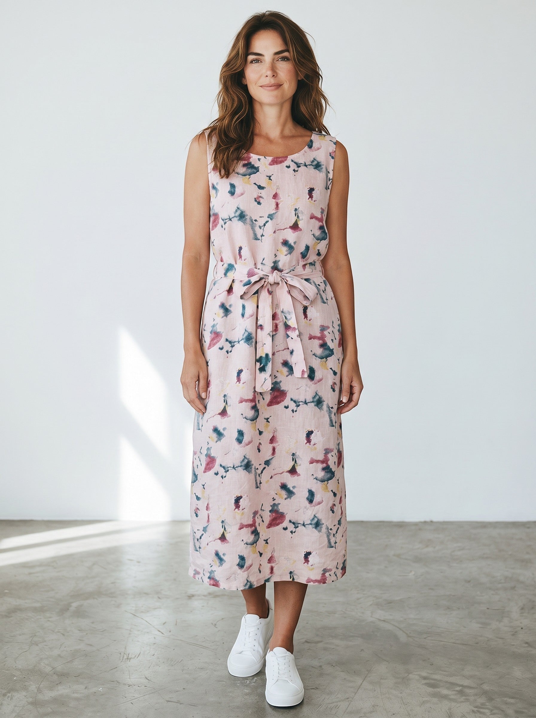 Rewearz pink linen midi dress with abstract floral print and tie waist, made in Italy.