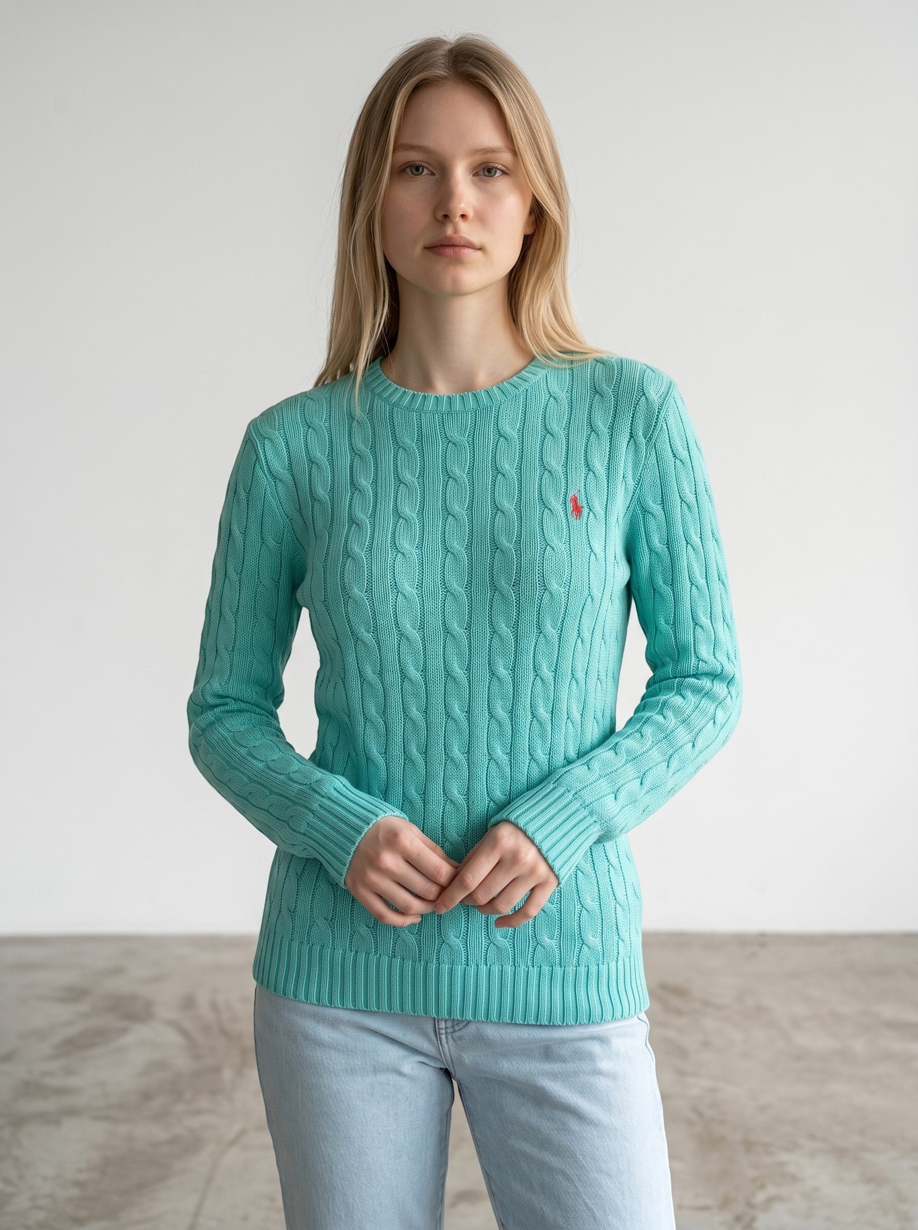 Rewearz turquoise cable knit crewneck sweater with red embroidered logo, size medium.